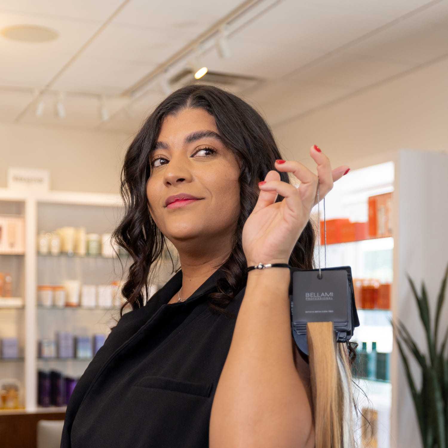 Portrait of Vicky, a professional stylist at Esmeralda’s Beauty Bar, showcasing their expertise and style.