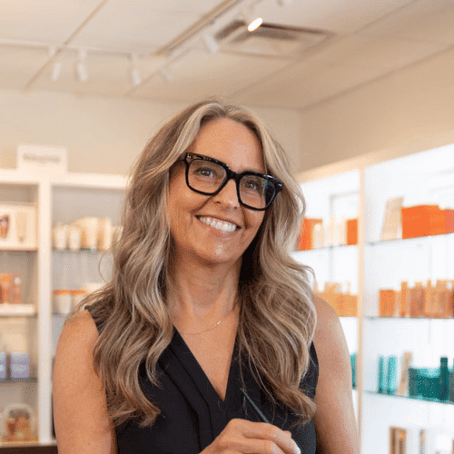 Portrait of Janet, a professional stylist at Esmeralda’s Beauty Bar, showcasing their expertise and style.